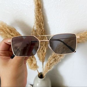 Gold frame sunglasses with gray lens